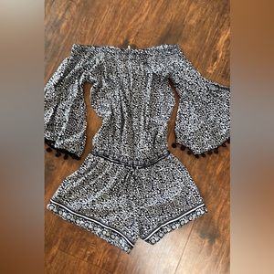 Anthro navy Pom Pom romper